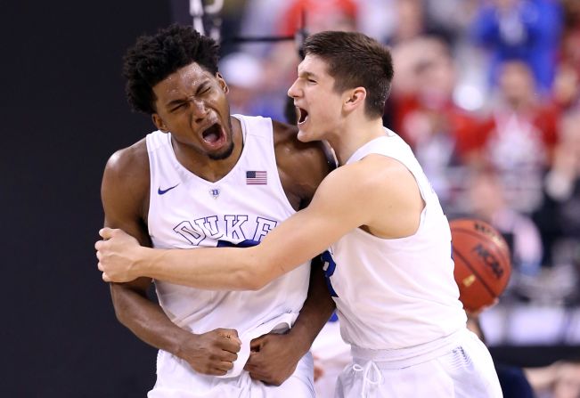 Duke guard Grayson Allen, right, hugs teammate Justise Winslow after a second-half play in the national championship game Monday, April 6, against Wisconsin. Duke won the game 68-63 in Indianapolis. It is the fifth national title for Duke head coach Mike Krzyzewski.