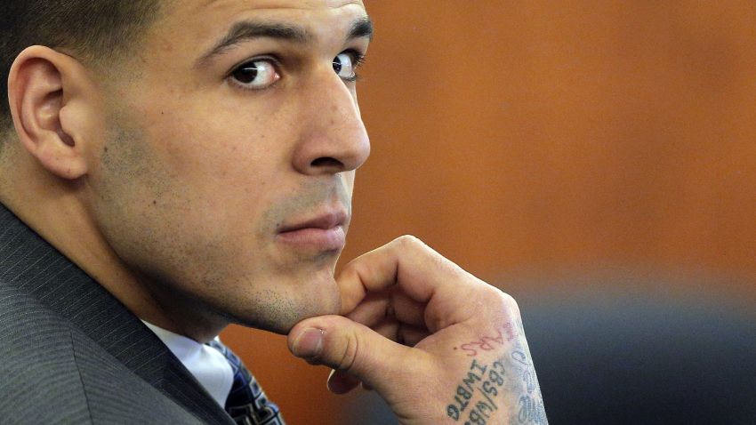 FILE - In this April 1, 2015 file photo, former New England Patriots NFL football player Aaron Hernandez listens as prosecution witness Alexander Bradley testifies during his murder trial, at Bristol County Superior Court in Fall River, Mass. Hernandez is accused of killing Odin Lloyd in June 2013. (AP Photo/Brian Snyder, Pool, File)