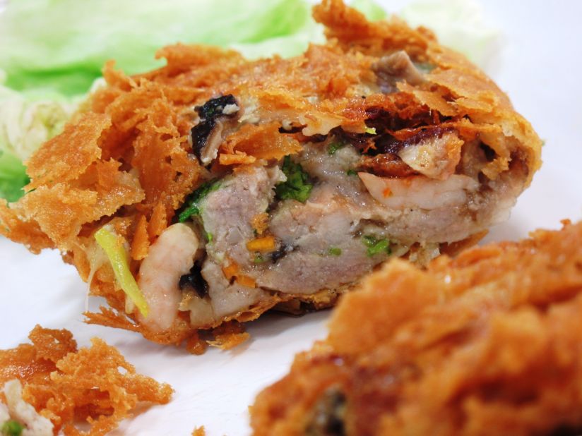 This duck roll comes filled with prawns, salted egg yolk, minced pork, coriander and mushrooms -- all deep fried to golden perfection in crumbly batter.