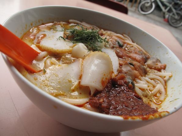 Sungei Road laksa is served simply, with a spoon to scoop all that goodness in one go.