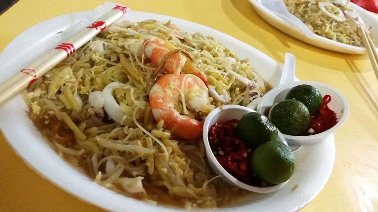 The intense seafood aroma and flavor rocks through every strand of a fried Hokkien prawn noodle.