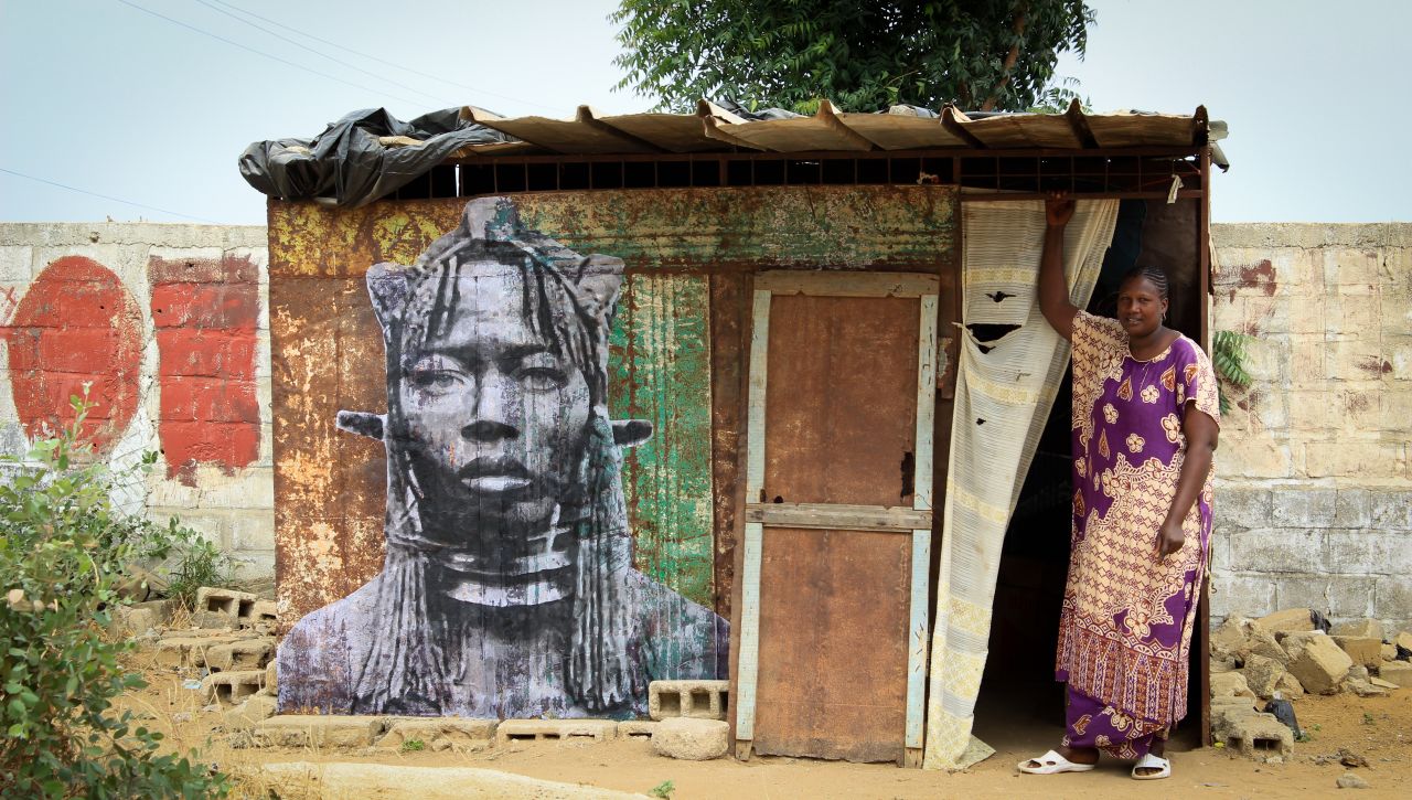 Yseult draws large scale portraits from old images and pastes them on the walls of female-owned businesses around Senegal, particularly on restaurants and breakfast stands.