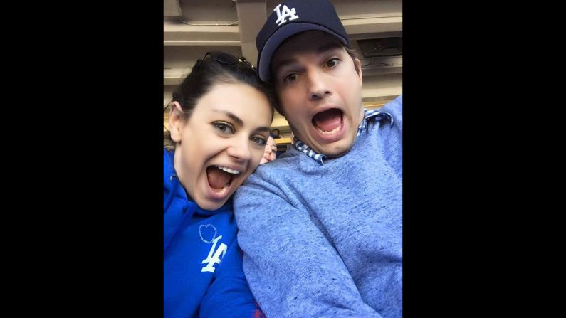 Actor Ashton Kutcher takes a selfie with his girlfriend, actress Mila Kunis, at a baseball game on Monday, April 6. "Love winning on opening day," <a href="https://www.facebook.com/Ashton/photos/a.10151889189547820.1073741828.56759922819/10152629613767820/?type=1&theater" target="_blank" target="_blank">Kutcher said on Facebook.</a> "Go Dodgers!"