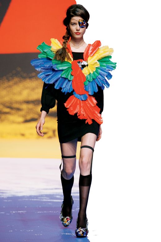 Nautical work wear has had a huge influence on catwalk fashion, and Butchart's book is broken up into the professions of officer, sailor, fisherman, sportsman, and pirate.<br />Here, pirate-inspired parrots and eye patches make a comeback in designer Jean-Charles de Castelbajac's 2010 summer collection.