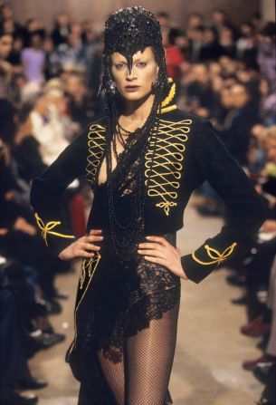 "The officer look starts in the mid-18th century with the British naval uniform and it's a lot more about Savile Row tailoring houses," explained Butchart.<br />"So it's a lot more stricter, smarter, very much focused on the idea of spectacular power dress, so things like gold braiding -- these visual markers of power."<br />Here, Officer-style gold braiding featured in British designer Alexander McQueen's 1996 autumn/winter collection.