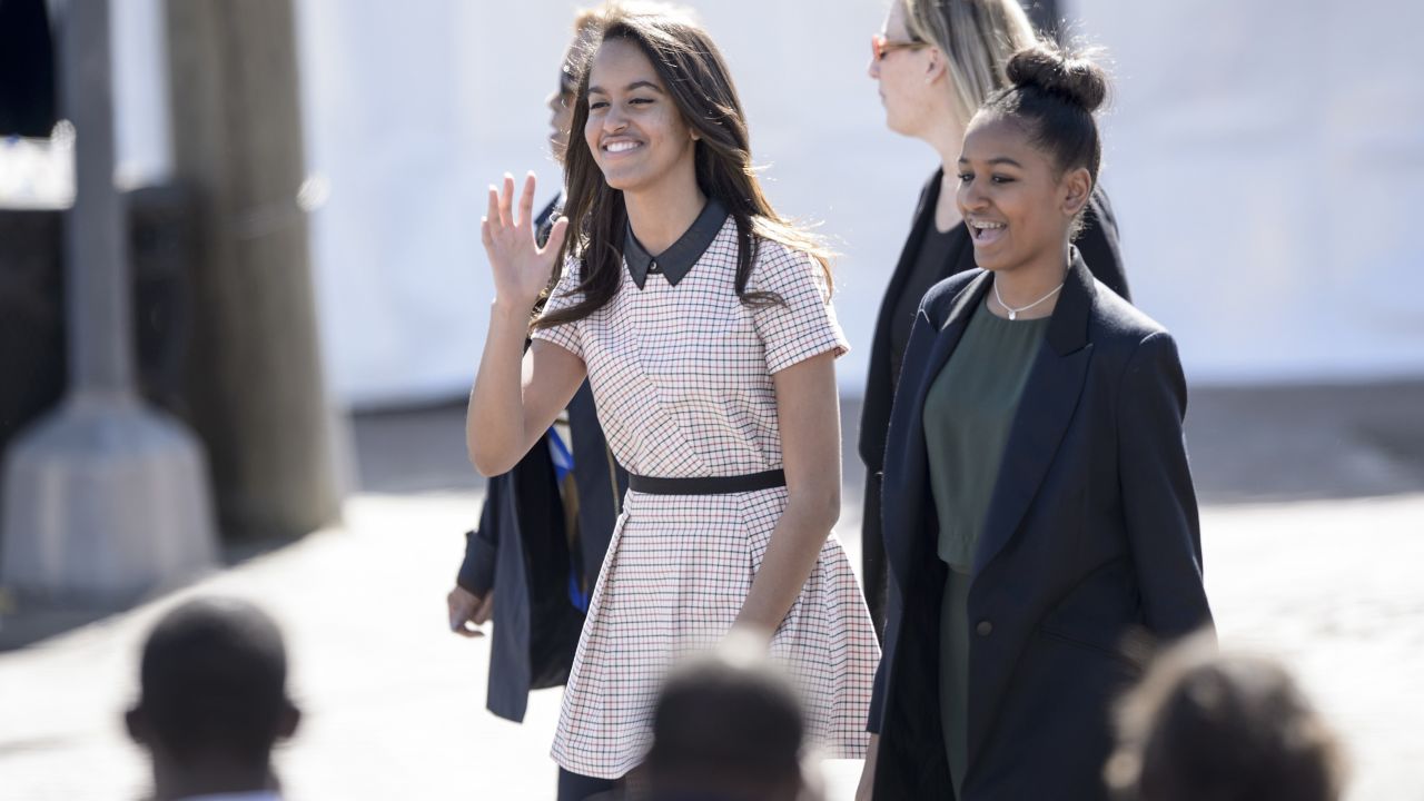 Malia and Sasha Obama arrive prior to their father, President Barack Obama, at the Edmund Pettus Bridge on March 7, 2015, in Selma, Alabama. The Obamas were in Alabama to commemorate the 50th anniversary of Bloody Sunday, when voting rights marchers attempting to walk to the Alabama capitol clashed with police.