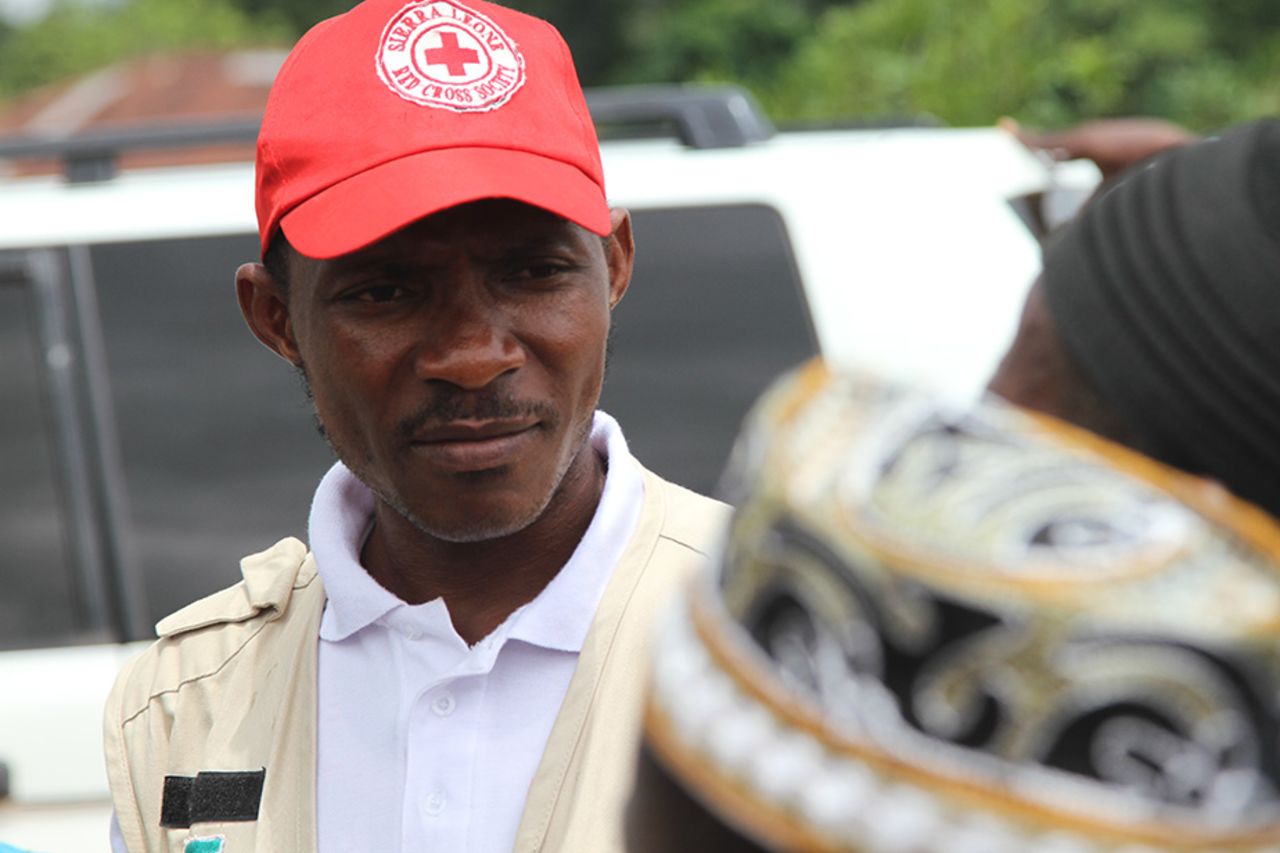 Daniel F.K. James works with <a href="http://www.sierraleoneredcross.net/" target="_blank" target="_blank">Sierra Leone's Red Cross Society</a> as a supervisor for the national <a href="http://www.cdc.gov/mmwr/preview/mmwrhtml/mm6401a6.htm" target="_blank" target="_blank">safe and dignified burials program.</a> "I am no longer actively involved in the burials. I have more of a monitoring and quality-control role," he said. "My job over the past year has changed greatly from doing active burials to monitoring, training and supervising Red Cross SDB teams which have greatly contributed to a lower rate of infection." His work, he believes, has been essential to helping his country improve their infection rate, and he keeps his team safe in the process.
