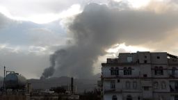 Caption:Smoke and flames rise allegedly from Shiite Huthi rebels camps located on Faj Attan Hill and Aser mountain following an airstrike by the Saudi-led alliance on April 6, 2015 in the Yemeni capital Sanaa. AFP PHOTO / MOHAMMED HUWAIS (Photo credit should read MOHAMMED HUWAIS/AFP/Getty Images)
