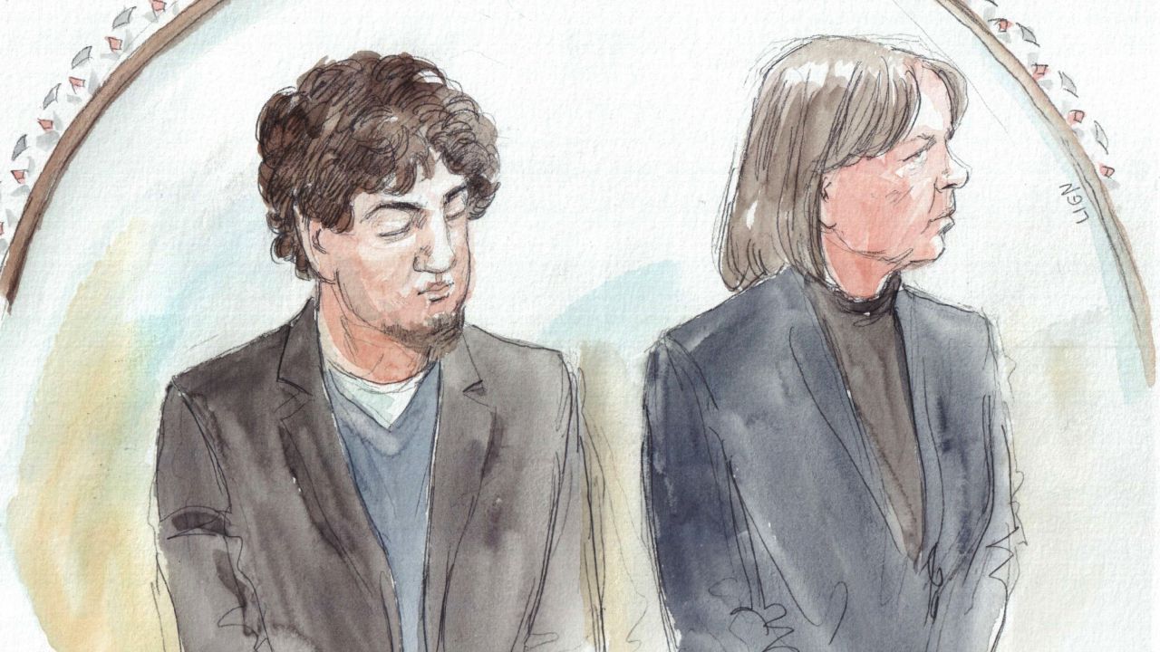Dzhokhar Tsarnaev stands beside his lawyer, Judy Clarke, as the verdict is read in court.
