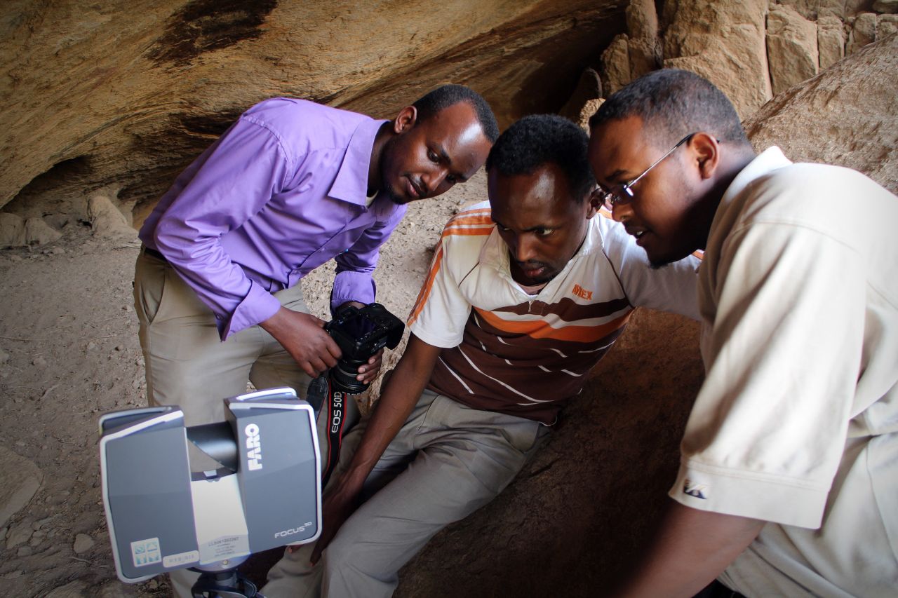 A group of CyArk volunteers in Somaliland, an autonomous region of Somalia, preparing to scan cave paintings.