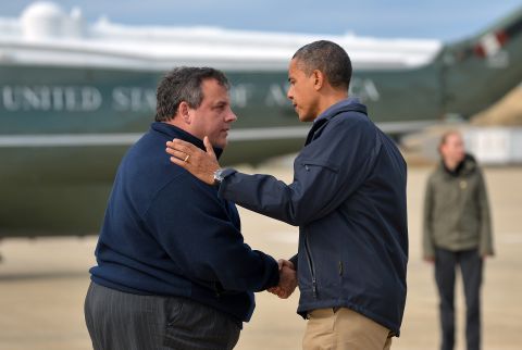 Christie greets President Barack Obama, who arrived in New Jersey to visit areas hit by Hurricane Sandy. The two <a href="http://politicalticker.blogs.cnn.com/2012/10/31/obama-takes-in-damage-with-christie-in-new-jersey/" target="_blank">toured devastated beach towns</a> together. "I think the people of New Jersey recognize that (Christie) has put his heart and soul into making sure that the people of New Jersey bounce back even stronger than before. I want to thank him for his extraordinary leadership and partnership," Obama said.