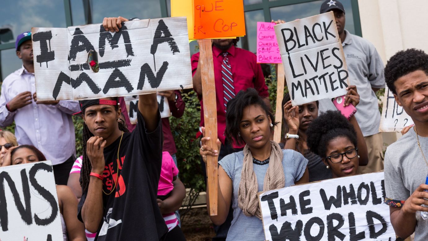 Some of those rallying outside North Charleston's City Hall held signs and wore shirts that said "Black lives matter." Scott was black. Slager is white.