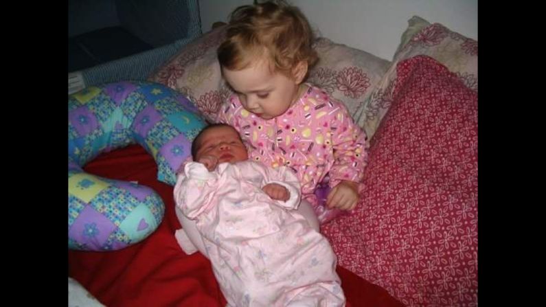 "A half-hour later, Jaden was still just staring at her, just as she is in the picture, mesmerized. Every so often she would reach down and touch Lilly-Belle's hair in pure amazement." -- <a href="index.php?page=&url=http%3A%2F%2Fireport.cnn.com%2Fdocs%2FDOC-1231986">Mike Bernstein</a>, Charlotte, North Carolina