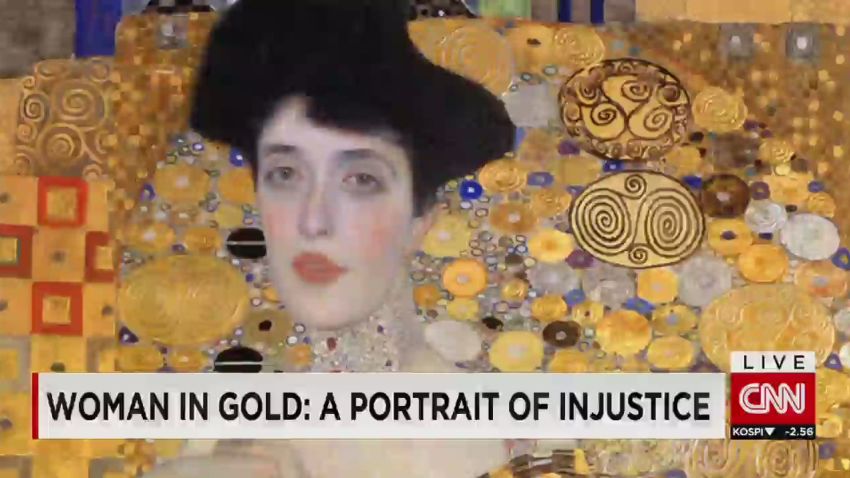 cnni newsroom woman in gold portrait burris_00024621.jpg