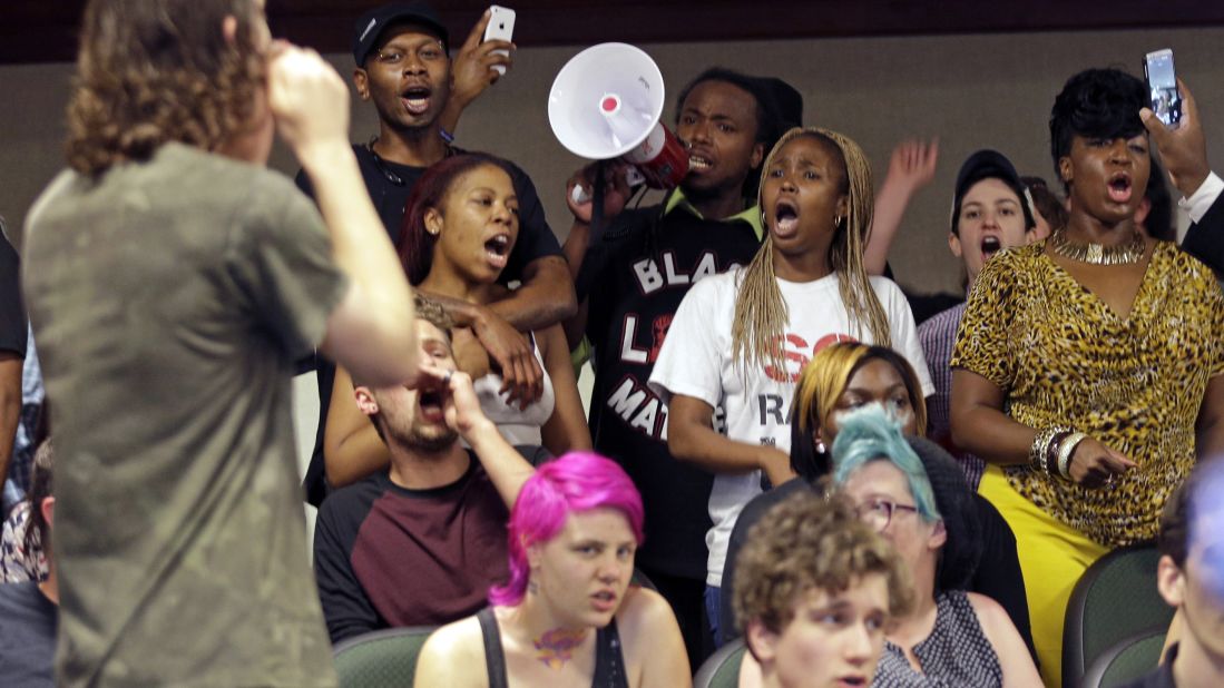 Protesters interrupt a press conference with North Charleston Mayor Keith Summey on April 8.