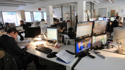 File photo: Journalists work in the editorial offices at France's TV5 Monde headquarters on February 7, 2012 in Paris. 