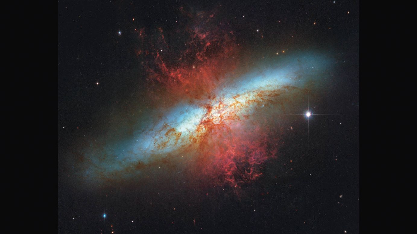 The Cigar Galaxy is 12 million light years away. It gets its name from its shape: From Earth it looks like an elongated elliptical disc. 