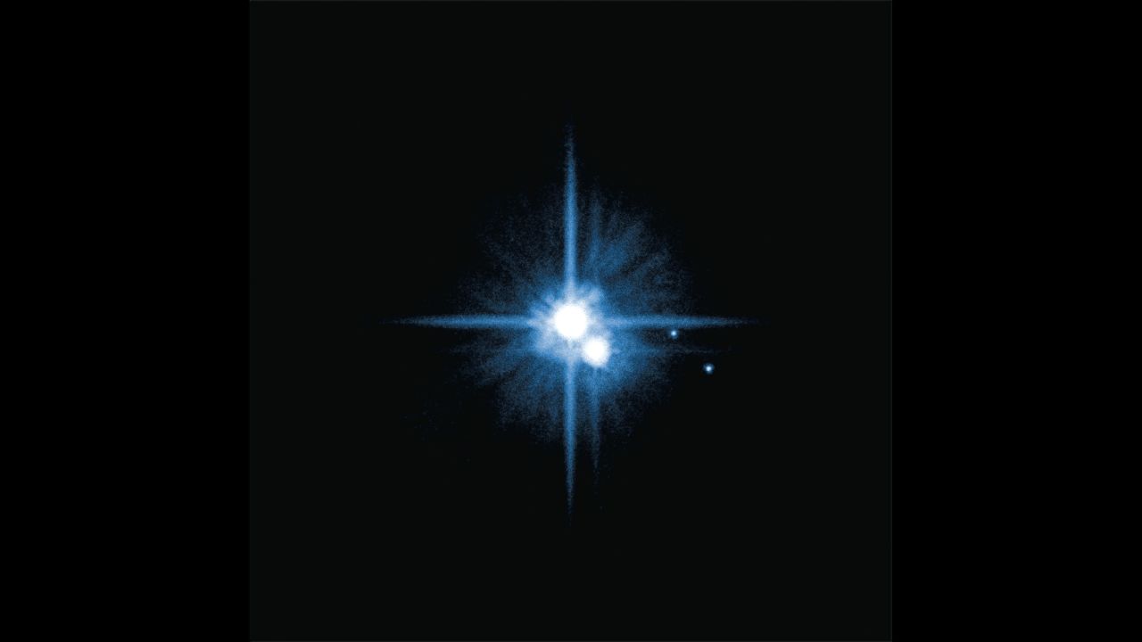 Hubble discovered four of Pluto's five moons. In 2005: Nix and Hydra were found. Hubble discovered Kerberos in 2011 and Styx in 2012. The new discoveries joined Pluto's large moon, Charon, which was discovered in 1978. Styx was found by scientists using Hubble to search for potential hazards for the New Horizons spacecraft which will fly by Pluto in July 2015. Pluto is about 2.9 billion miles from Earth.