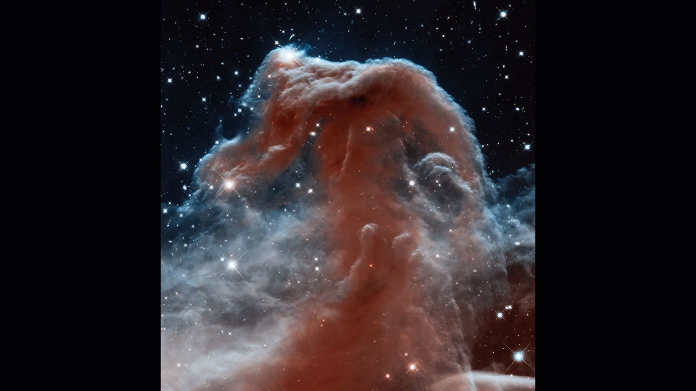 The iconic Horsehead Nebula is a favorite target for astronomers. Look carefully and you'll see what looks like the head of horse rising into the stars. This Hubble image captures the nebula in infrared wavelengths. The nebula is 1,600 light years from Earth.