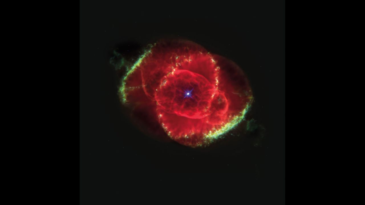 The Cat's Eye Nebula is a bunch of glowing gases kicked out into space by a dying star. This Hubble Space Telescope image shows details of structures including jets of high-speed gas and unusual knots of gas. This color picture is a composite of three images taken at different wavelengths. The nebula is estimated to be 1,000 years old. It's about 3,000 light years from Earth in the constellation Draco.