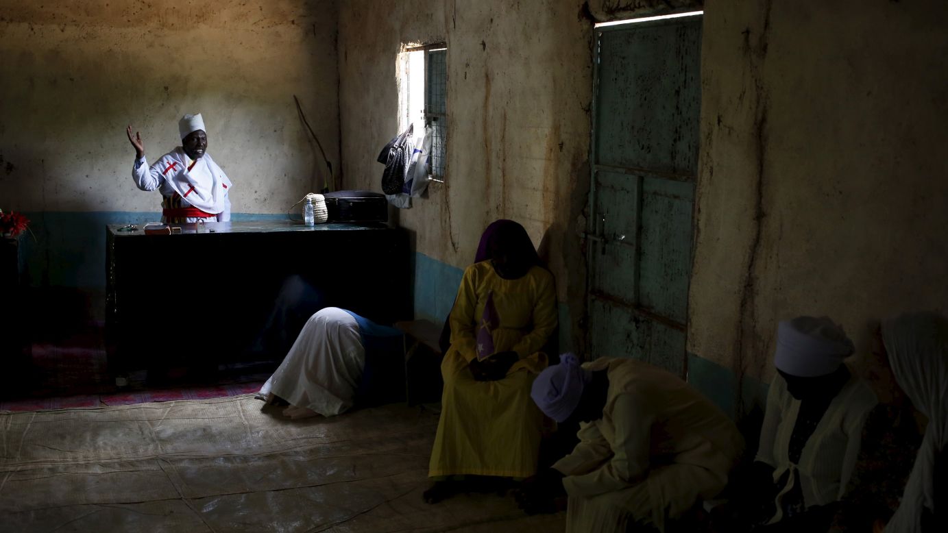 Christians pray during an Easter service in Garissa, Kenya, on Sunday, April 5. Three days earlier, <a href="http://www.cnn.com/2015/04/02/world/gallery/kenya-university-attack/index.html" target="_blank">at least 147 people were killed</a> when gunmen stormed a Garissa college during morning prayers. The Somalia-based Al-Shabaab militant group claimed responsibility for the assault.