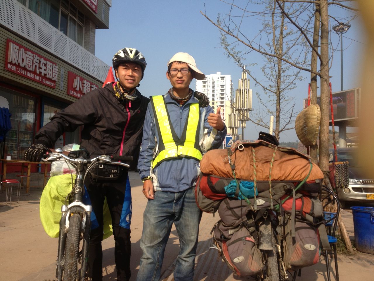 Wang (right) stretched a paltry budget of just more than $100 with help from friends along the route.