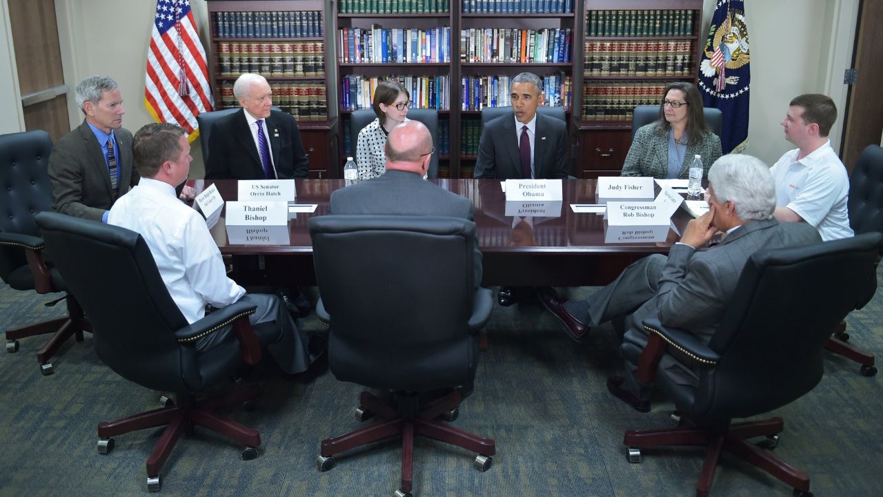 U.S. President Barack Obama takes part in a roundtable discussion on clean energy Friday, April 3, at Hill Air Force Base in Utah. The man on the far right, Lance Futch, works for a solar company called Vivint. He told the <a href="http://nypost.com/2015/04/08/man-stunned-when-meeting-with-federal-official-turns-out-to-be-obama/" target="_blank" target="_blank">New York Post</a> he had no idea he was meeting with the President that day and that it would be an informal meeting with a federal official. "So when President Obama walked in the room, I'm looking down at my white polo going, 'Well, if I would have known this, I would have worn my military blues or at least a suit and tie,' " said Futch, who is also a member of the Air National Guard. "I admit I was feeling a little underdressed at the moment."