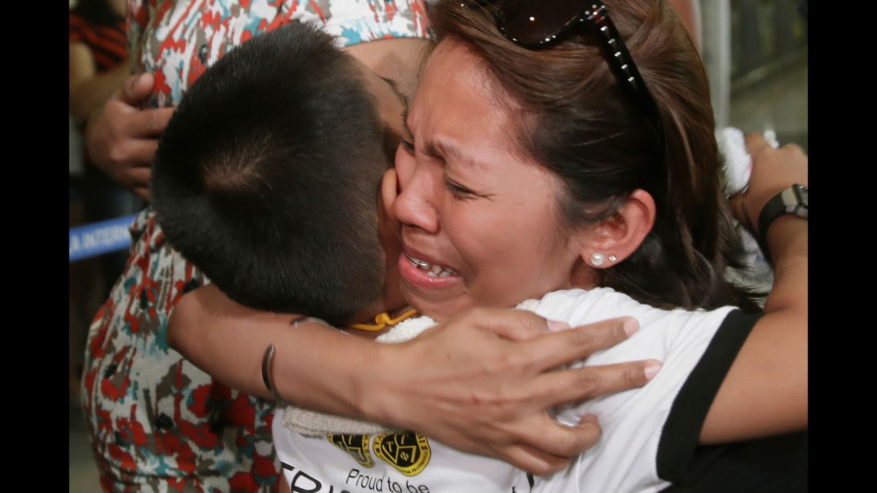 Aileen Tatualia hugs her only child, 5-year-old Prinz Leenbert, shortly upon her arrival in Manila, Philippines, on Thursday, April 9. Tatualia was part of the first batch of Filipino workers to be repatriated from Yemen following the recent <a href="http://www.cnn.com/2015/01/20/world/gallery/yemen-unrest/index.html" target="_blank">Saudi-led airstrikes</a> there. She hadn't seen her son since he was 10 months old. 