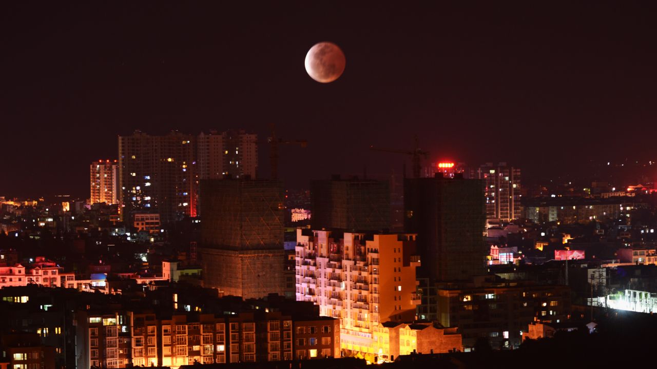 A red moon is seen in Luoping County, China, during a total lunar eclipse on Saturday, April 4.