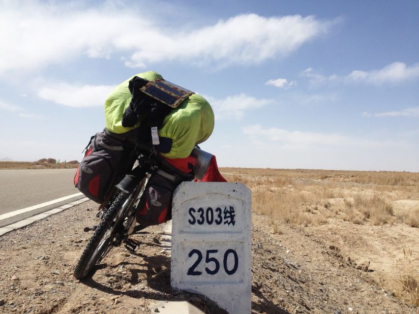 Wang and his bike survived the often unforgiving landscape of Qinghai in northwestern China.