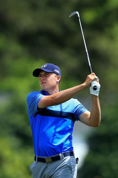 While Woods battled to stay in touch, one of the young pretenders to his crown was scorching the famed Atlanta course. Jordan Spieth, 21, claimed the lead late in the day. Joint runner-up last year, this time he opened with eight-under 64 -- capped by a birdie at his final hole. 