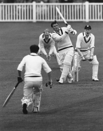 Richie Benaud of Australia hits out to leg during a cricket match on May 3, 1956. 