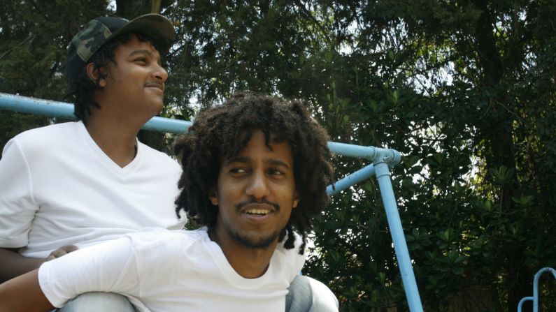 Jojo, now 24, hanging out with his older brother Bilal, a 28-year-old film student. 