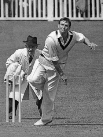 Australian cricketer and team captain Richie Benaud in a cricket match in Brisbane, Australia on December 5, 1958. 