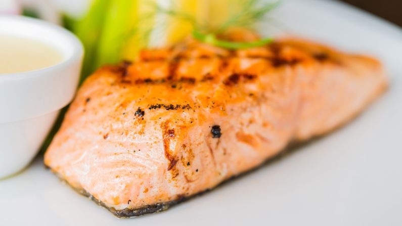 The MIND diet suggests eating at least one serving of fish a week. In contrast, <a href="index.php?page=&url=http%3A%2F%2Fwww.uhs.wisc.edu%2Fhealth-topics%2Fhealthy-lifestyle%2Fdocuments%2FMediterranean.pdf" target="_blank" target="_blank">the Mediterranean diet</a> suggests eating more like 2-3 servings a week. Salmon, considered a "superfood," gives you a high dose of omega-3 fatty acids which studies show lower the risk of heart disease and fight inflammation. <a href="index.php?page=&url=http%3A%2F%2Fresearchnews.osu.edu%2Farchive%2Fomega3.htm" target="_blank" target="_blank">Earlier studies</a> showed it also reduces anxiety.