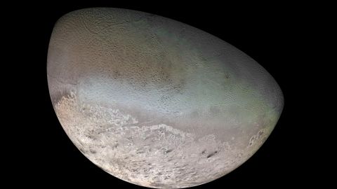 Neptune's largest moon, Triton, is so cold that its surface is composed mainly of nitrogen ice. <br />