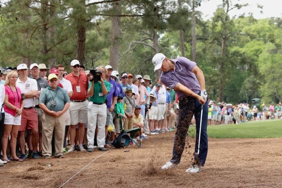  Jordan Spieth shooting from the 14th hole during the second round of the Masters on Friday. The 21-year-old broke the Masters record for the tournament halfway mark, finishing 14 under par. 