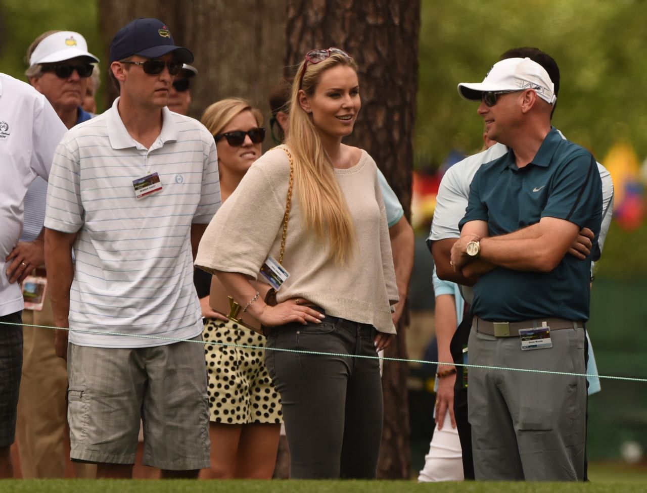 Vonn watches Woods during the Masters golf tournament earlier this year. 