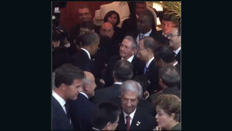 President Obama greets and shakes hands with Cuban leader Raul Castro at the Summit of the Americas in Panama City, Panama.