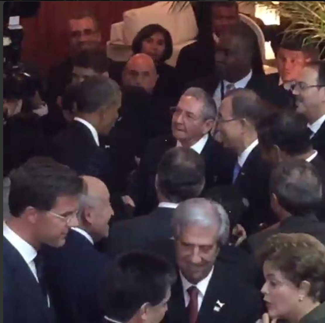 President Obama greets and shakes hands with Cuban leader Raul Castro at the Summit of the Americas in Panama City, Panama.