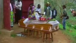 cnni kriel pkg village holds funeral for masscre victim_00022710.jpg