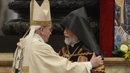 Aram I, head of the Catholicosate of the Great House of Cilicia, speaks with Pope Francis during an Armenian-Rite Mass Sunday at St. Peter's Basilica.