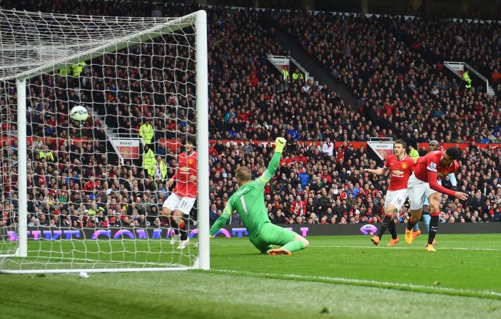 Chris Smalling (right) headed United's fourth goal from Young's free-kick.
