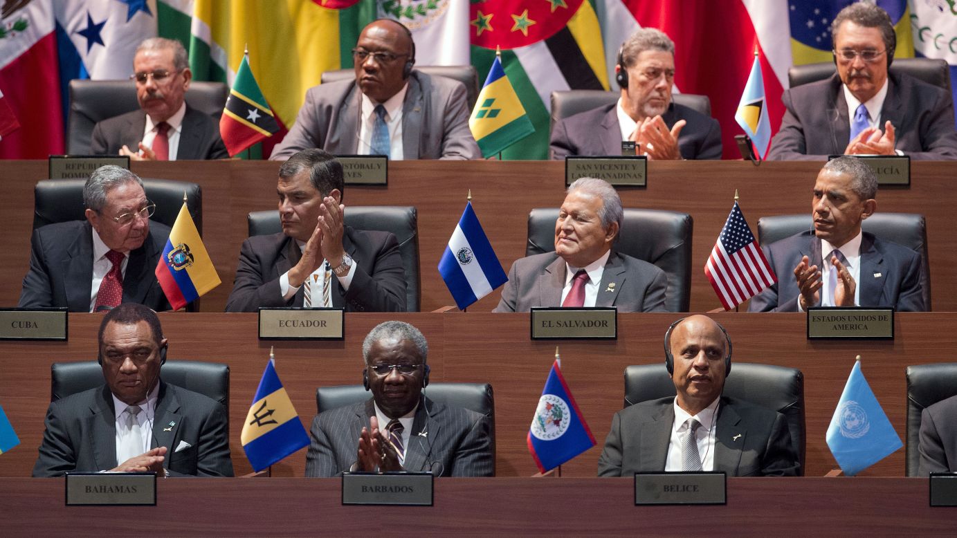Obama, right middle row, and Castro, left middle row, and other world leaders participate in the Summit of the Americas on April 10.