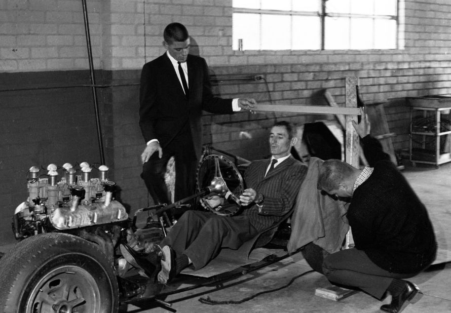 Ken Miles, a key member of the Shelby racing team, tries out for size the body mock-up on the CSX2287 chassis.
