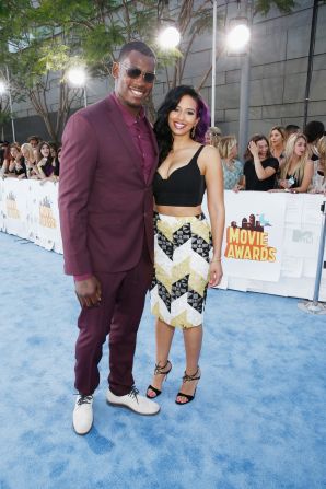 Lights, camera, Aldon! Joined by presenter Nessa, NFL star Aldon Smith tackled the MTV Movie Awards in glamorous fashion on Sunday. 