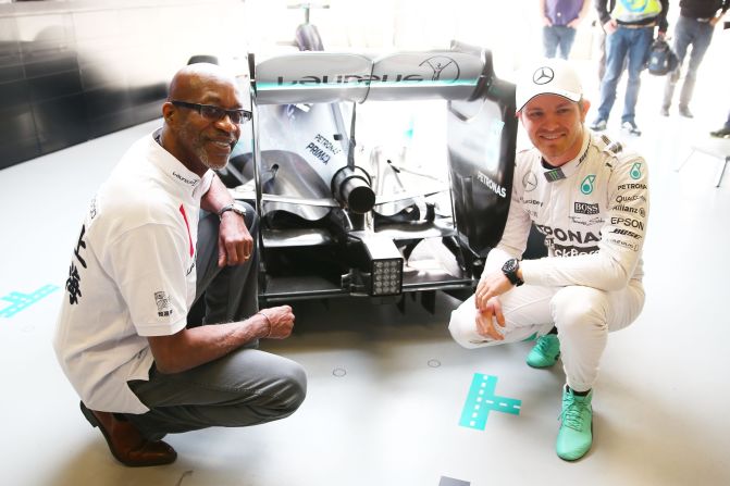 Former gold medal-winning hurdler Edwin Moses (L) checked out the Silver Arrows' ride at the Chinese Grand Prix -- Mercedes went on to win despite<a href="index.php?page=&url=http%3A%2F%2Fe%2F2015%2F04%2F12%2Fmotorsport%2Fchinese-grand-prix-2015%2F" target="_blank" target="_blank"> Nico Rosberg's (R) frustration with Lewis Hamilton's slow pace.</a>