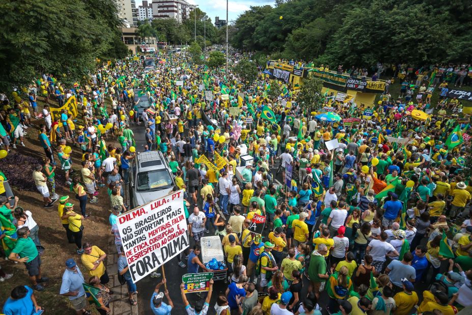 Protesters gather in Porto Alegre. The President has not been implicated in the investigation, but she was the Energy Minister and chairwoman of Petrobras during much of the time that the alleged corruption took place.