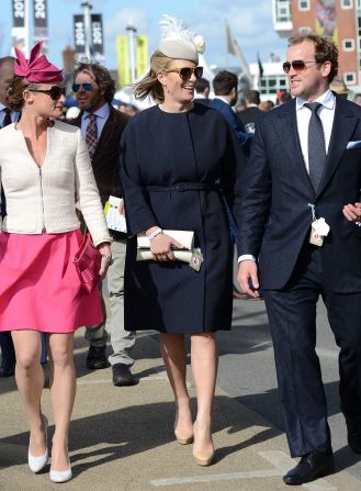Zara Phillips (center) has many hats --  equestrianism and royalty being two of them. The silver medal-winning Olympian (and second-eldest grandchild of Queen Elizabeth II) graced the Grand National on Saturday where <a href="index.php?page=&url=https%3A%2F%2Fwww.cnn.com%2F2015%2F04%2F13%2Fsport%2Fgallery%2Fsport-celebrity-i-spy%2Fht%2F2015%2F04%2F11%2Fsport%2Fhorse-racing-grand-national-many-clouds%2F" target="_blank">25-1 outsider Many Clouds raced to victory.</a>