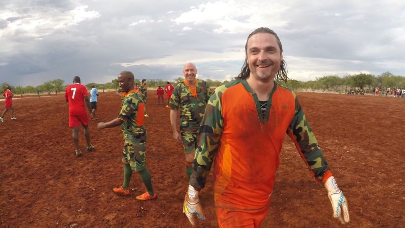 Goalkeeper Pfannenstiel gets ready to play against a local side -- which included teachers, park rangers and a veterinary surgeon -- along with fellow Global United founding member Geert Brusselers (center) and former Namibia star Lolo Goraseb.